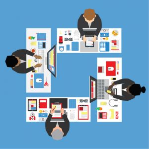 Illustration of a bird's-eye view of four people in corporate attire working at desks that have been arranged into square shape with all the workers facing inward.