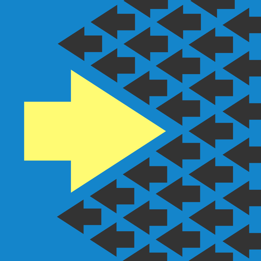 Illustration of a large arrow pointing to the right in a crowd of smaller arrows pointing to the left, signifying going against the flow. (godruma © 123RF.com)