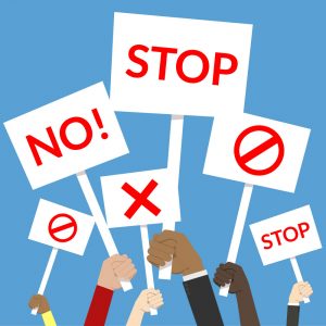 Illustrations of multiple arms holding up signs with words and symbols representing "no" and "stop."