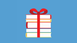 A red bow is wrapped around a stack of books.