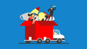 Truck with large open moving box on the back. Two people are perched on the edge of the box which is filled with belongings.