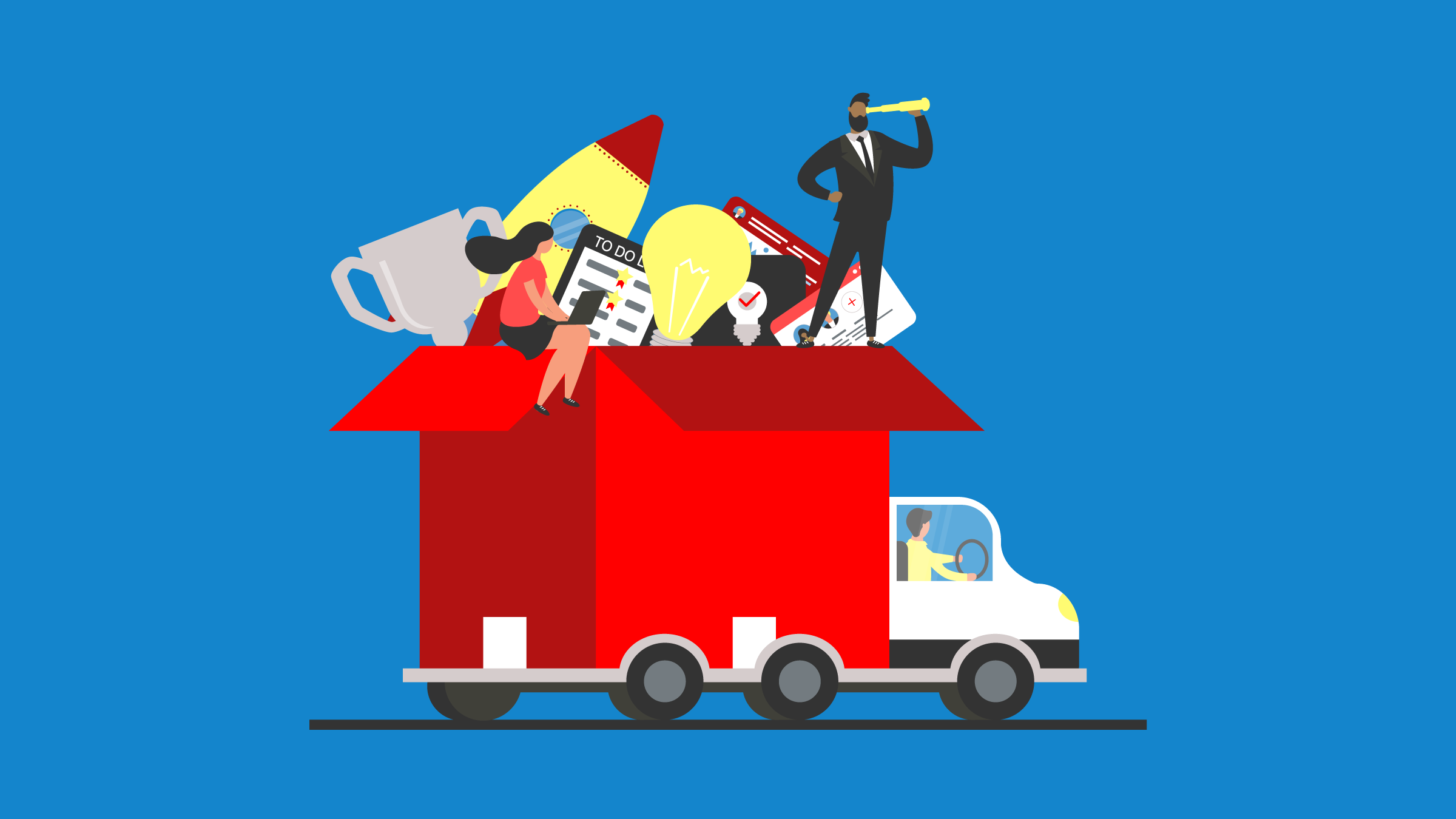 Truck with large open moving box on the back. Two people are perched on the edge of the box which is filled with belongings.
