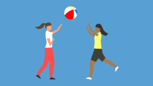 Two people playing catch with a large ball. (Copyright: bsd555 © 123RF.com)